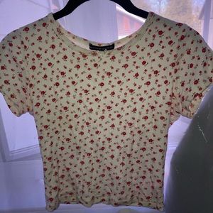 The cutest floral ashlyn bow Brandy Melville top!